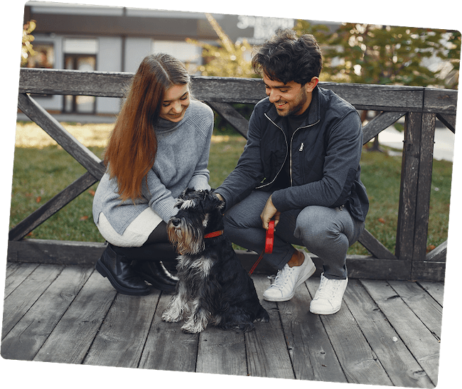 Happy couple with their dog